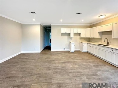 Bank owned property. This 2-bedroom, 2-bath home features an - photo 3