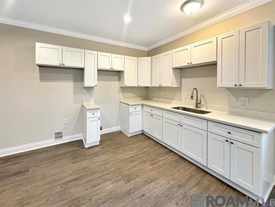 Bank owned property. This 2-bedroom, 2-bath home features an - photo 4