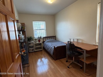 Welcome to 1066 East 100th Street, a well-maintained two-family - photo 5