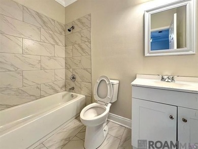 Bank owned property. This 2-bedroom, 2-bath home features an - photo 9