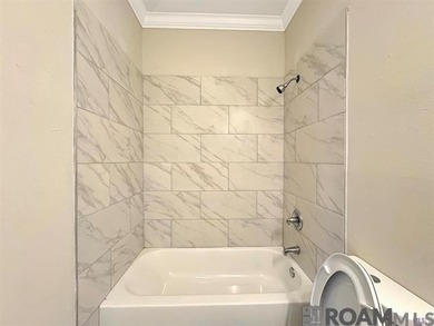 Bank owned property. This 2-bedroom, 2-bath home features an - photo 10