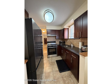Welcome to 1066 East 100th Street, a well-maintained two-family - photo 10