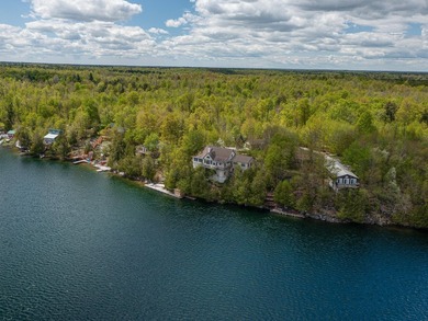This exquisite lakefront retreat stands as a testament to - photo 4