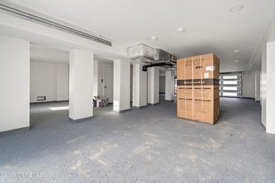 The epitome of a modern coastal New Construction waterfront home