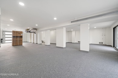 The epitome of a modern coastal New Construction waterfront home