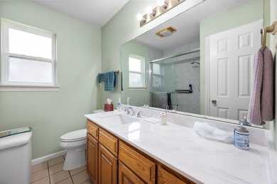 This well maintained gem of a home offers comfort, quality - photo 6