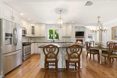 Beautifully Renovated Expanded Ranch Nested On A Quiet - photo 7