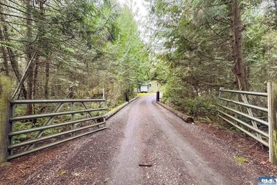 Welcome to Emerald Forest Ranch, a serene retreat tucked within - photo 50