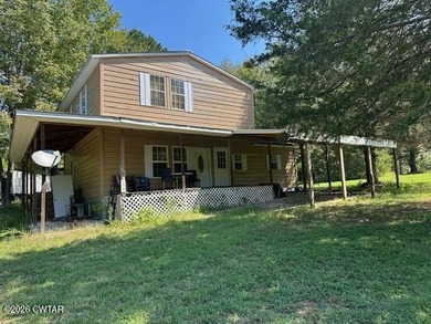 7.10 beautiful acres, with 3 homes. The main home is two story - photo 1