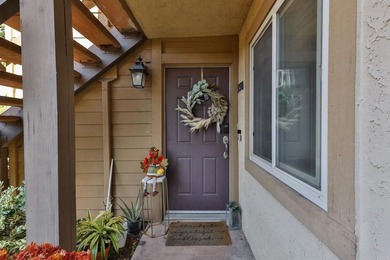 Welcome to this 2 bedroom, 2 bathroom ground-floor corner condo - photo 1