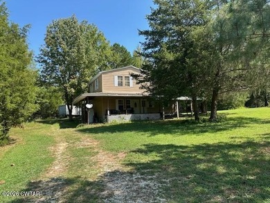 7.10 beautiful acres, with 3 homes. The main home is two story - photo 3