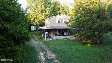 7.10 beautiful acres, with 3 homes. The main home is two story - photo 4