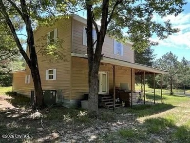 7.10 beautiful acres, with 3 homes. The main home is two story - photo 5