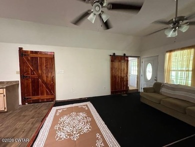 7.10 beautiful acres, with 3 homes. The main home is two story - photo 10