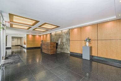 WELCOME TO 9511 SHORE RD #112! A LUXURIOUS, PREMIER CONDO - photo 3