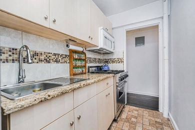 WELCOME TO 9511 SHORE RD #112! A LUXURIOUS, PREMIER CONDO - photo 6