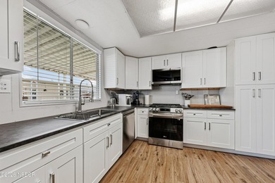 This beautifully updated manufactured home located in the - photo 12