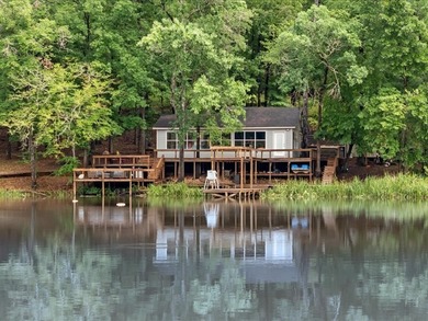 Lakeside Living on Private Lake Ioni! A Hidden Retreat is tucked - photo 2