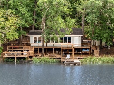 Lakeside Living on Private Lake Ioni! A Hidden Retreat is tucked - photo 3