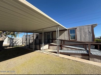 Located in a desirable 55+ community, this well-maintained