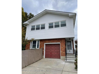 Spacious two-family high ranch situated on an oversized corner - photo 1