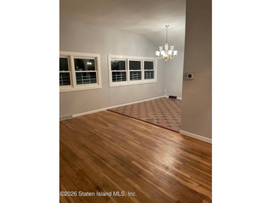Spacious two-family high ranch situated on an oversized corner - photo 2