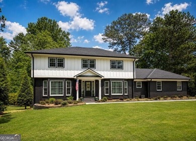 Great Buy with Over $200,000 in renovations since 2021 on this - photo 1