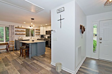 Are you seeking a move in ready 3 bedroom home tucked away in - photo 3