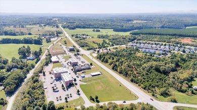 This commercial lot is located in the growing development of - photo 9