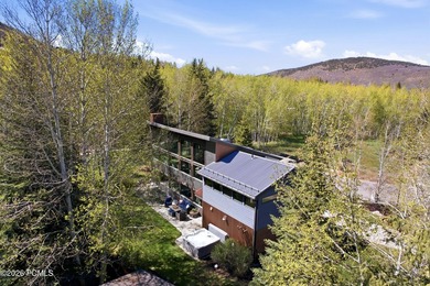 Nestled beside nearly three acres of Rotary Park open space and - photo 3