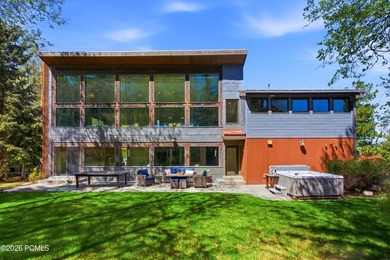 Nestled beside nearly three acres of Rotary Park open space and - photo 4