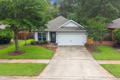 Newer LVP flooring flows through this open-concept Hammock Bay - photo 2