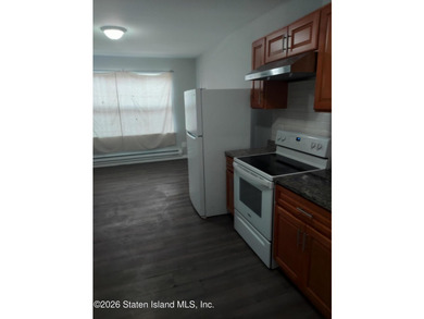 2 FAMILY END UNIT HAS A 3 BEDROOM MAIN AND A BRAND NEW STUDIO - photo 2