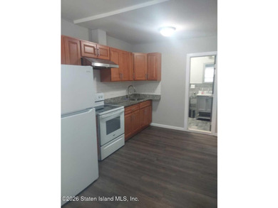 2 FAMILY END UNIT HAS A 3 BEDROOM MAIN AND A BRAND NEW STUDIO - photo 3