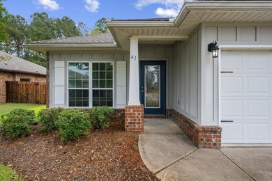 Newer LVP flooring flows through this open-concept Hammock Bay - photo 4
