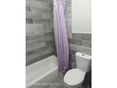 2 FAMILY END UNIT HAS A 3 BEDROOM MAIN AND A BRAND NEW STUDIO - photo 4