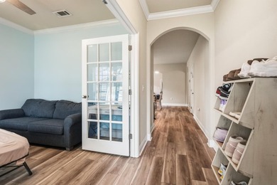 Newer LVP flooring flows through this open-concept Hammock Bay - photo 6