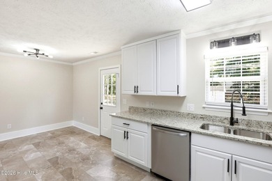 Beautifully renovated and move-in ready, this 3-bedroom, 2-bath - photo 11