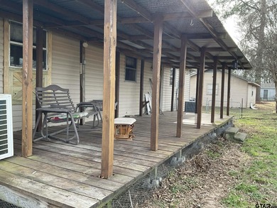 Charming 3 bedroom, 2 bath home situated on approximately .41