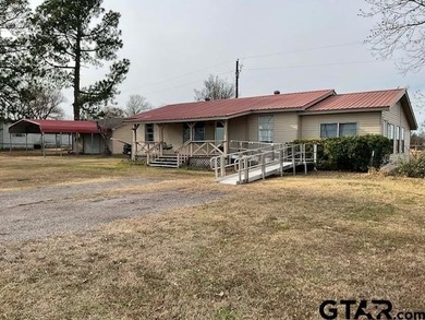 Charming 3 bedroom, 2 bath home situated on approximately .41