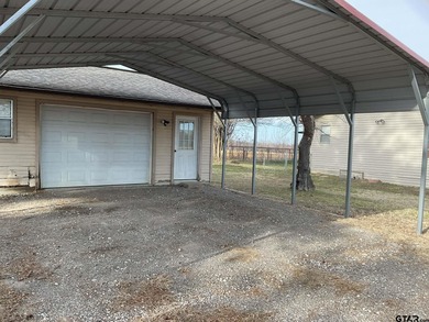 Charming 3 bedroom, 2 bath home situated on approximately .41