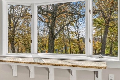Set gracefully on 1.55 acres and positioned back from the road - photo 18
