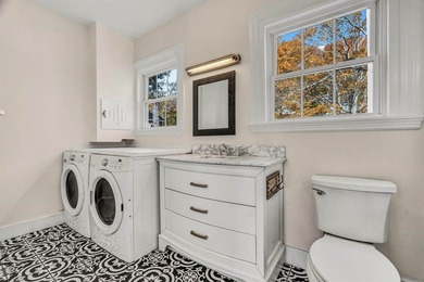 Set gracefully on 1.55 acres and positioned back from the road - photo 38