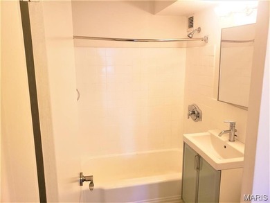 Investment Opportunity in Secure Downtown Apartment with 8th