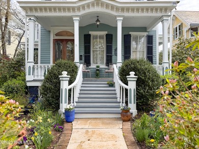 This meticulously maintained Italianate home is presented for