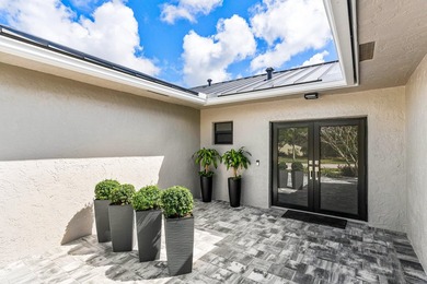Stunning Modern Home with Heated Pool! Situated in desirable - photo 5