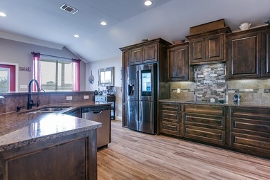This stunning 4-bedroom, 2-bath home showcases the beautiful - photo 19