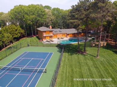 A sweeping circular driveway welcomes you to this ultra-private - photo 1