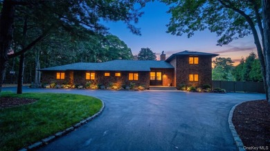 A sweeping circular driveway welcomes you to this ultra-private - photo 3