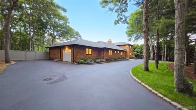 A sweeping circular driveway welcomes you to this ultra-private - photo 6